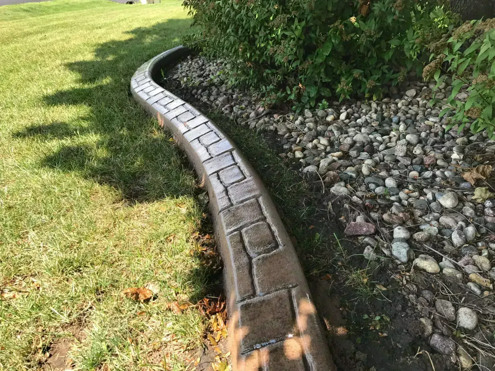 Professional concrete curbing in progress