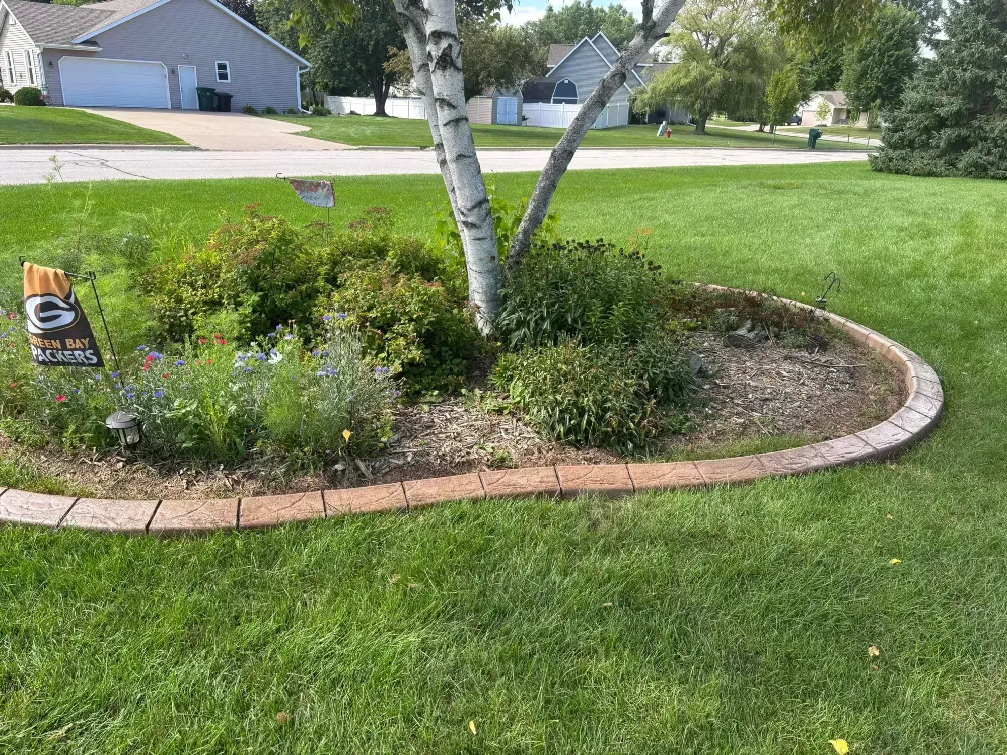 Tree ring curbing around mature oak tree