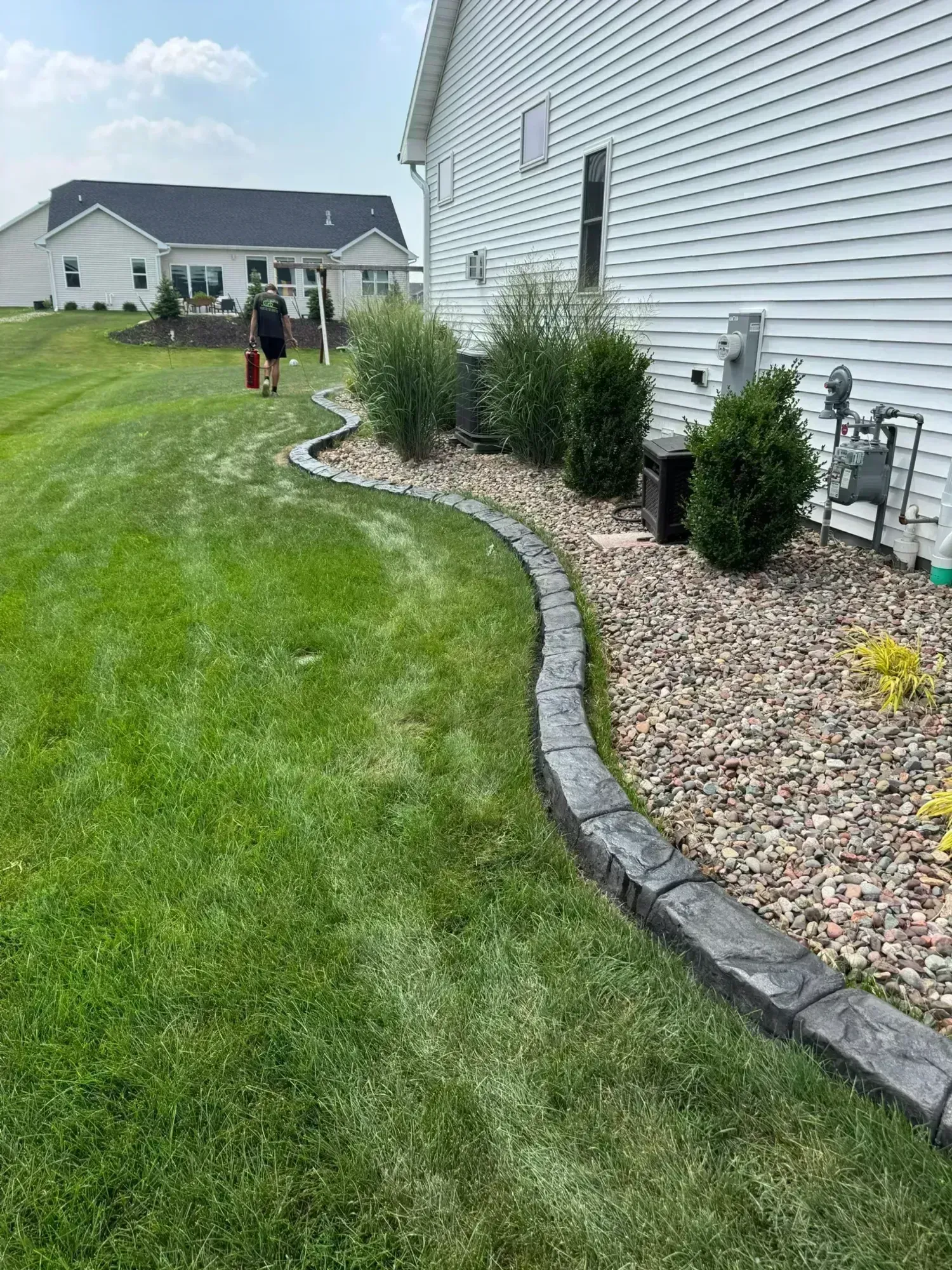 Decorative curbing with stamped pattern finish